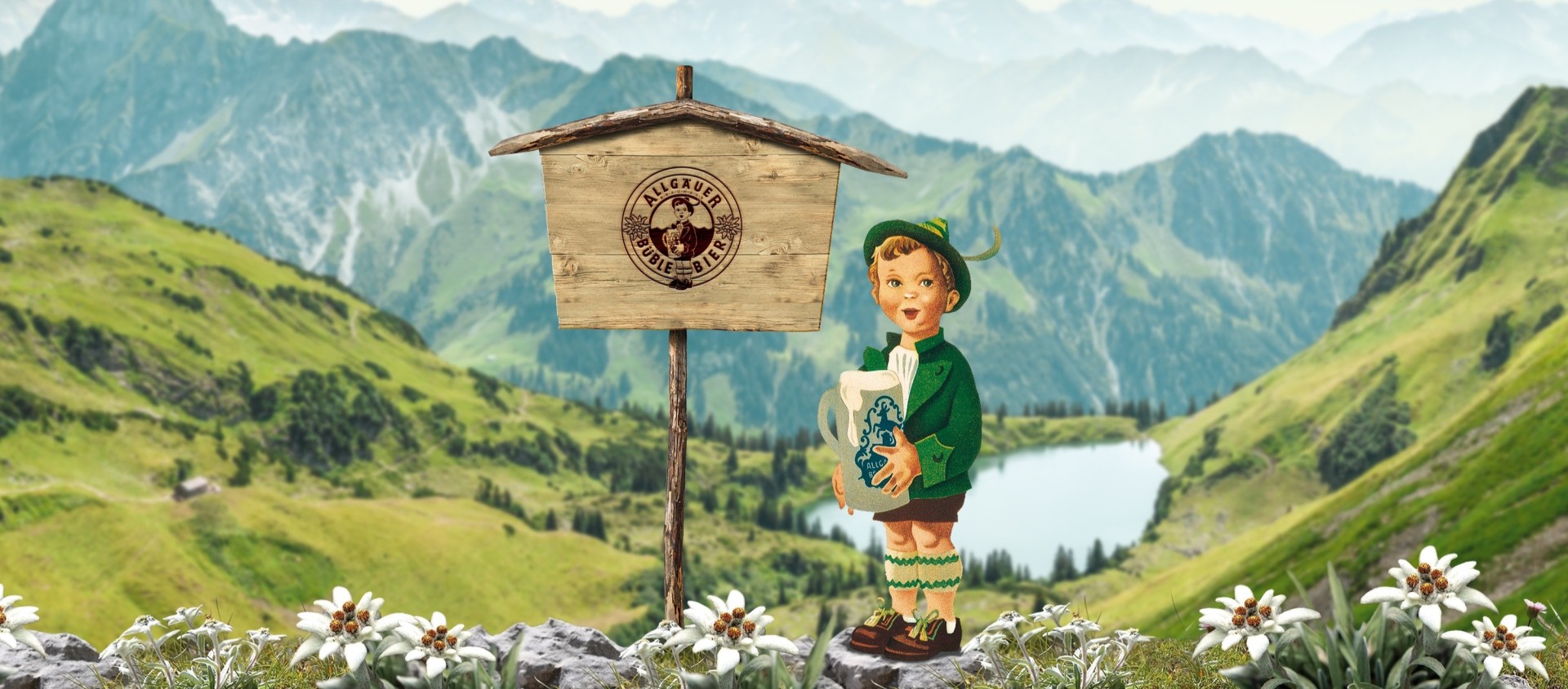 Büble Junge vor Alpenlandschaft