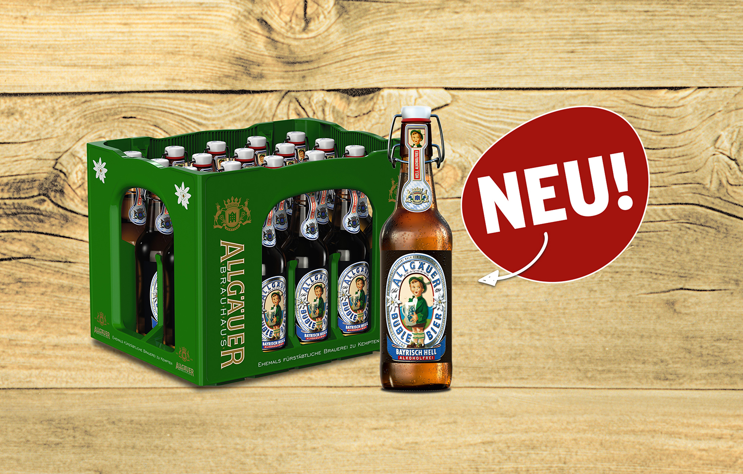 Eine Büble Bayrisch Hell alkoholfrei Flasche steht vor einem Bierkasten, daneben der Hinweistext Neu.